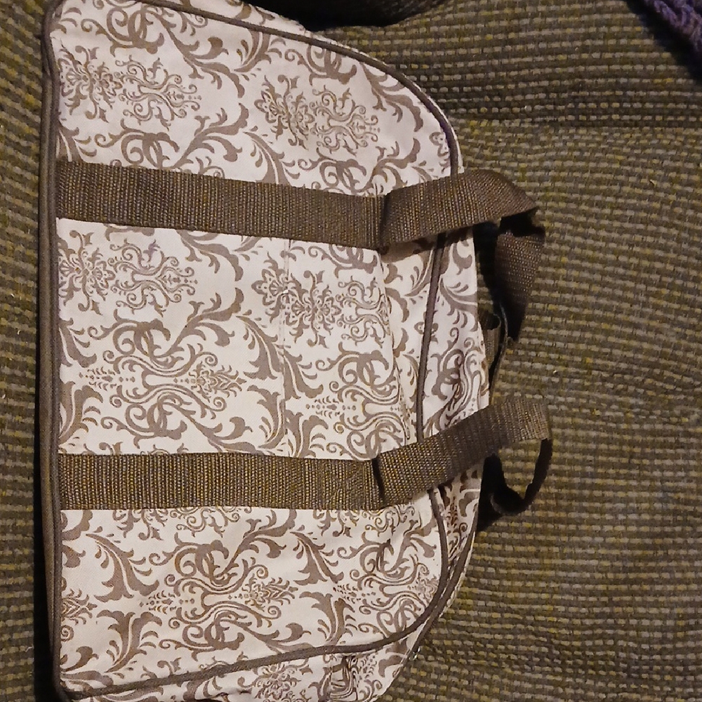 Elegant Brown Patterned Baby Bag With Bottle And Wipes Pouches